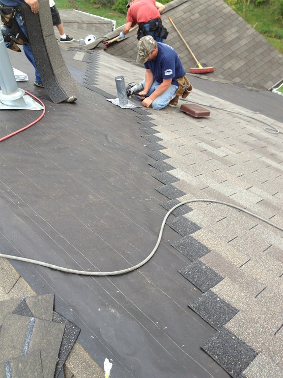 Installing new shingled roof