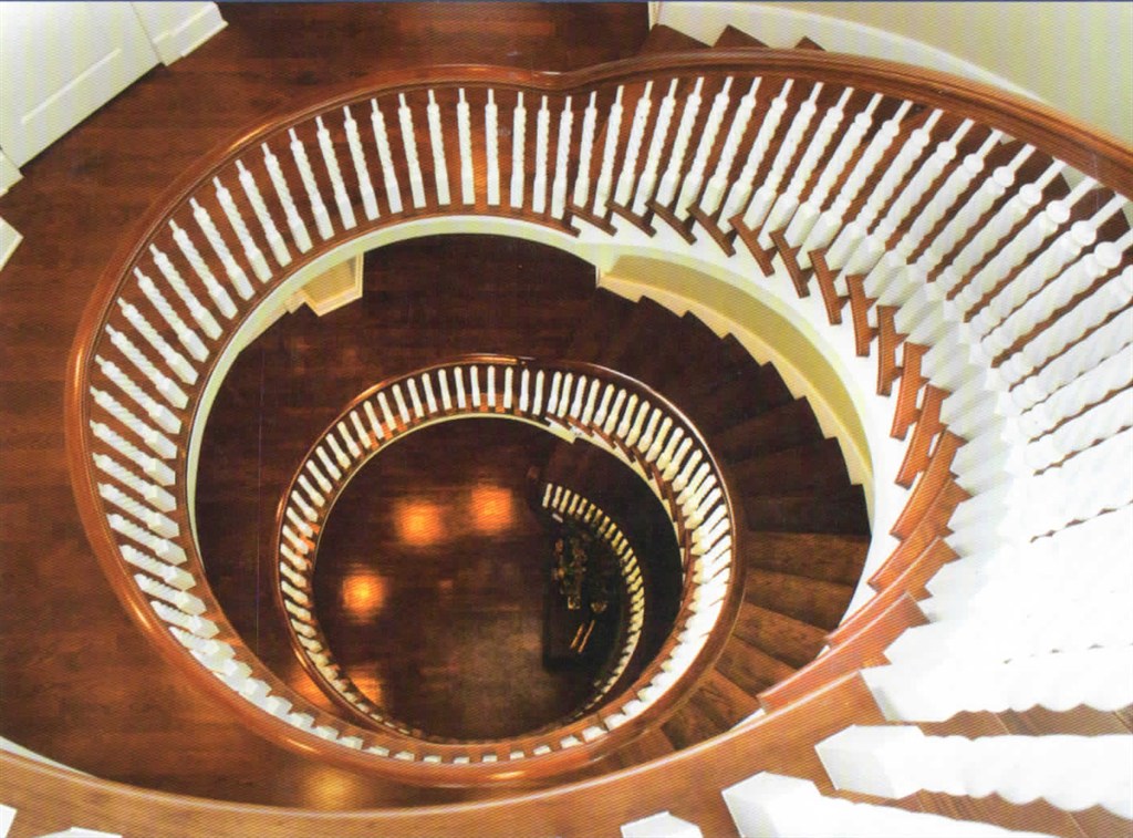 Imagine a continuous rail curved stairway
