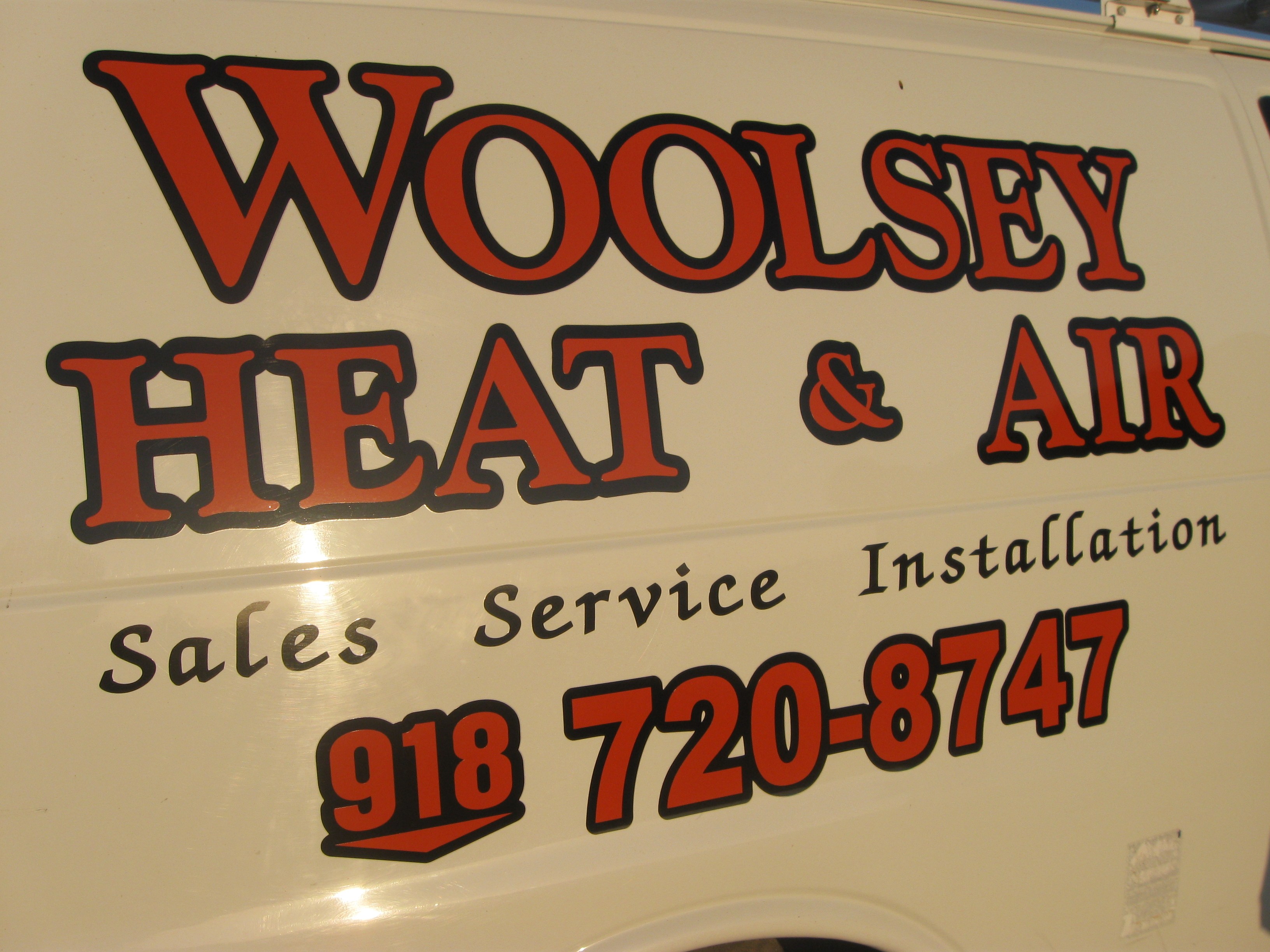 Woolsey Heat and Air logo