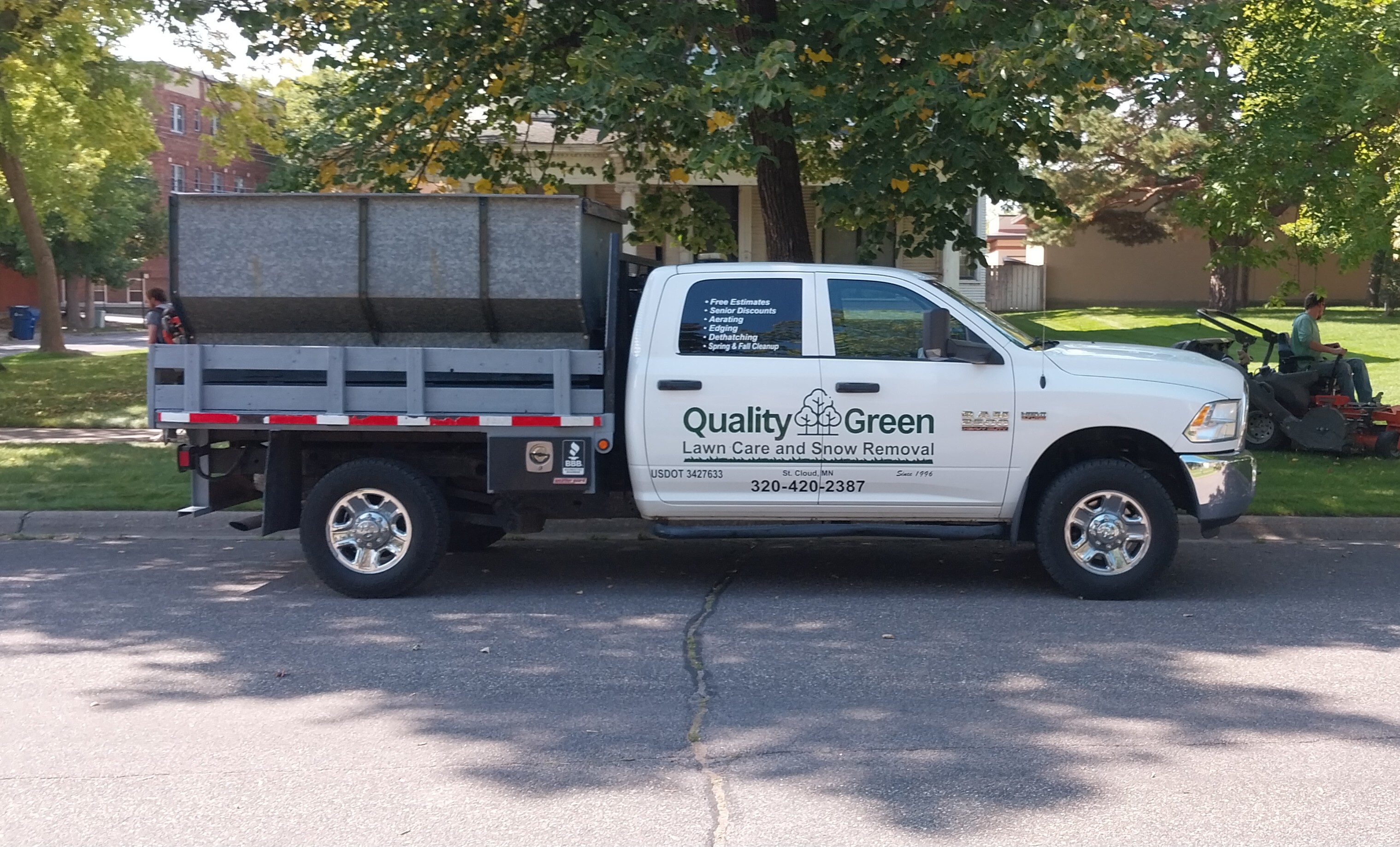 Quality Green Lawn Care & Snow Removal logo
