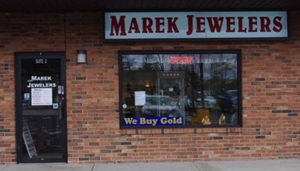 MAREK JEWELERS logo