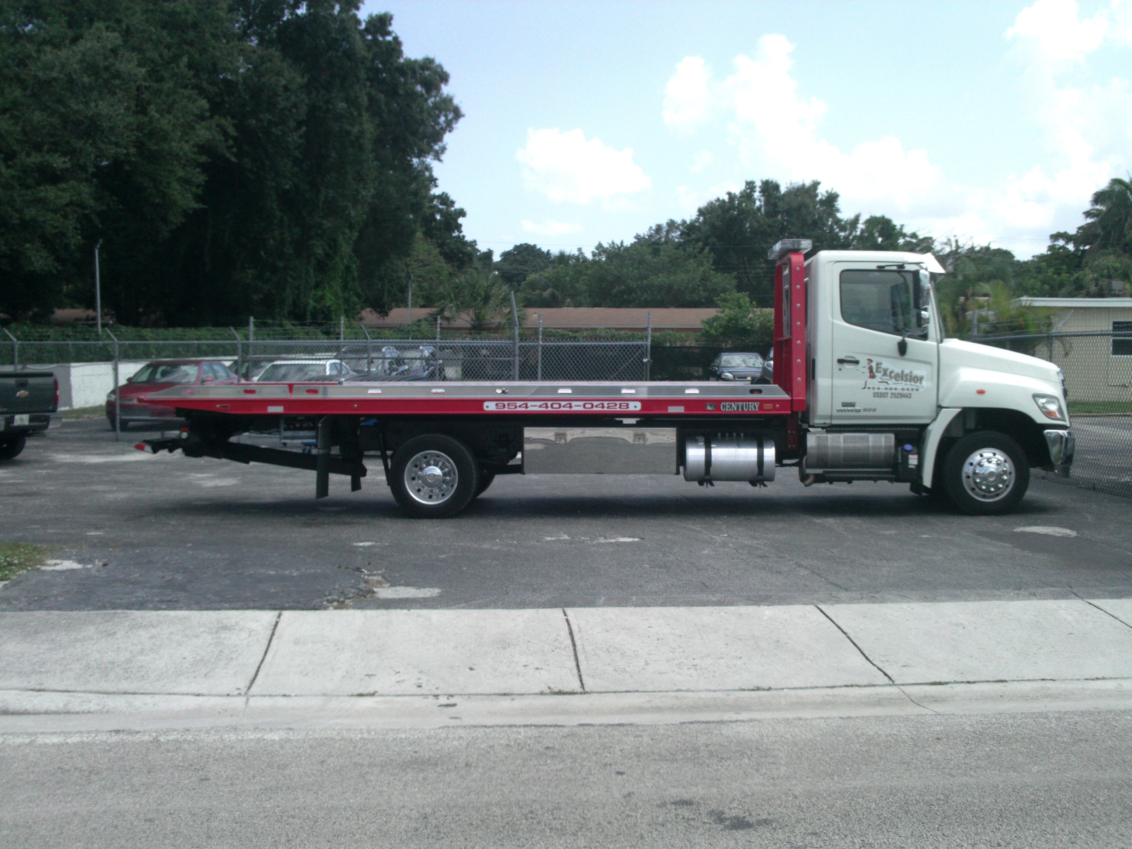 Excelsior Transport & Recovery LLC logo