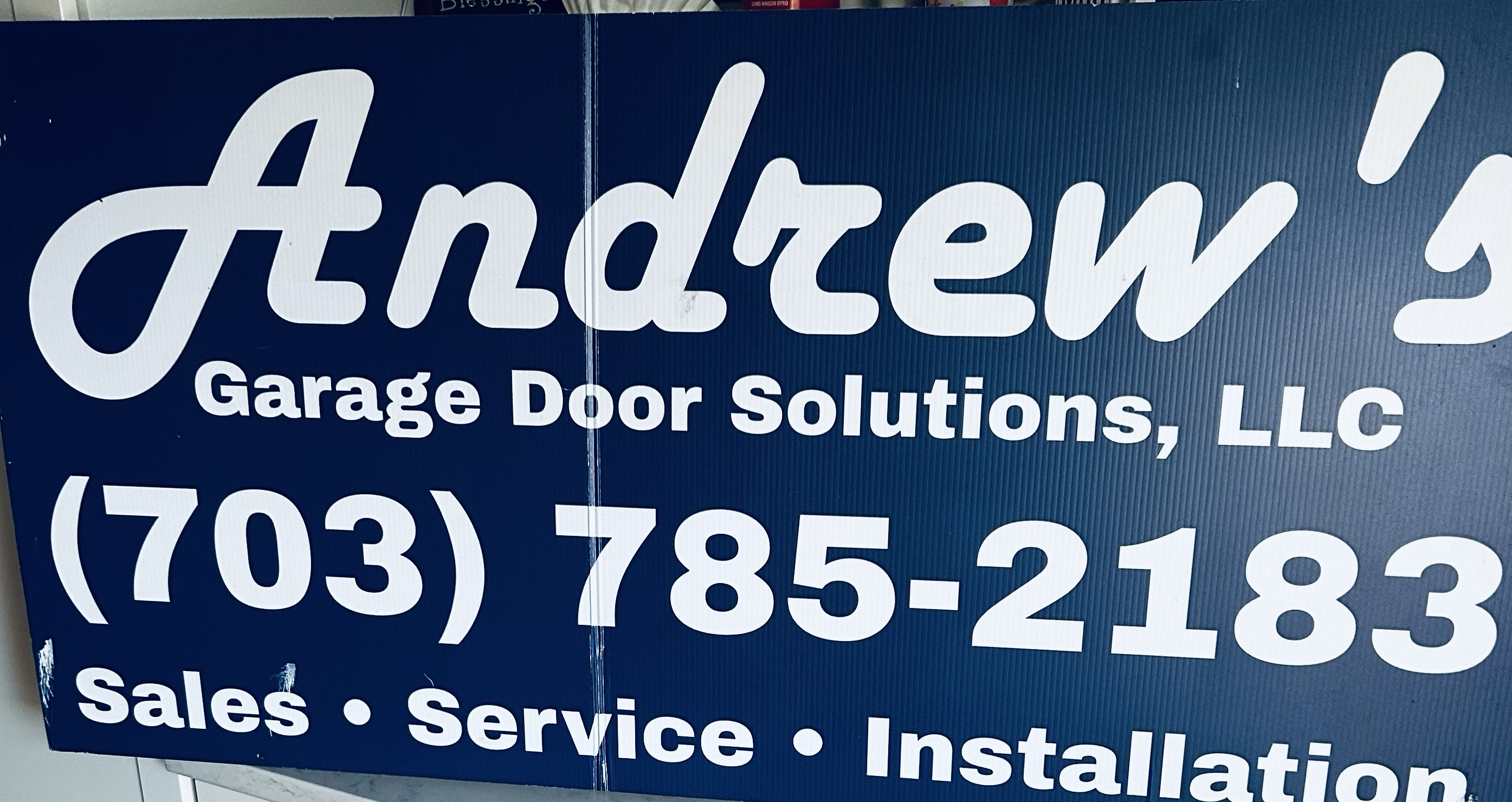 Logo for Andrew's Garage Door Solutions