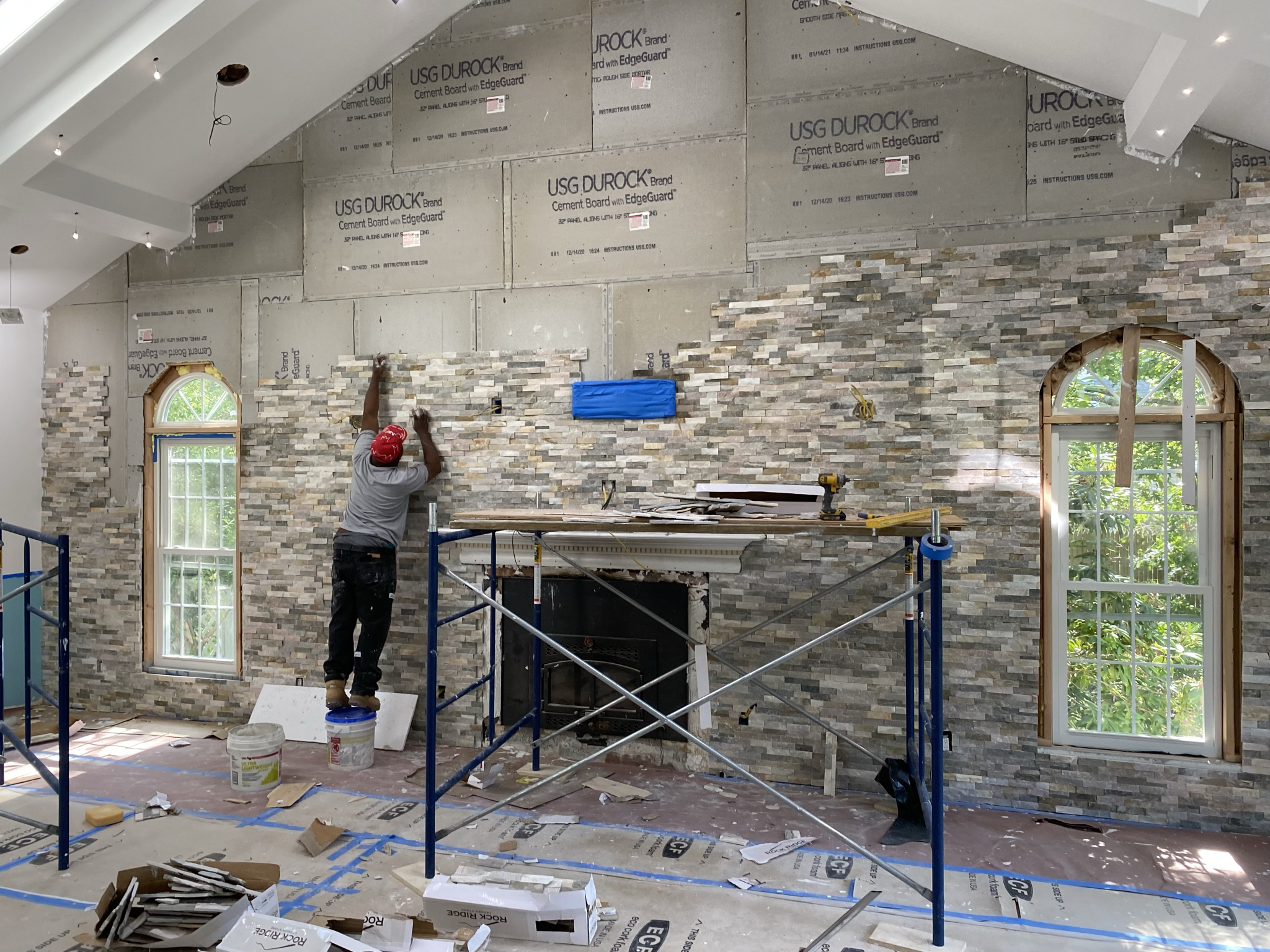 Emanuel painting company logo