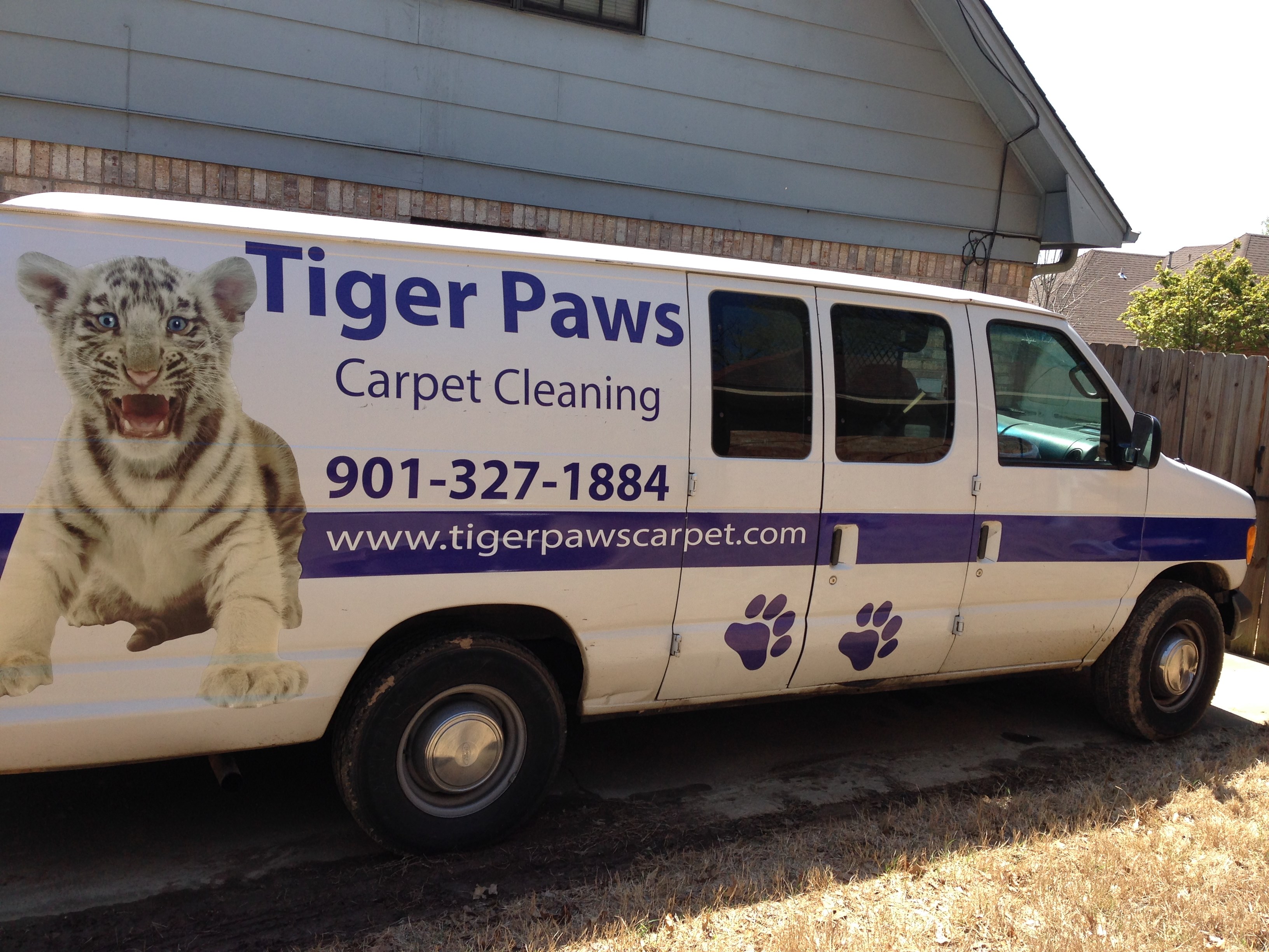 Logo for Tiger Paws Carpet & Upholstery Cleaning
