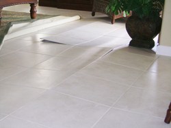 Buckling Tile Floor