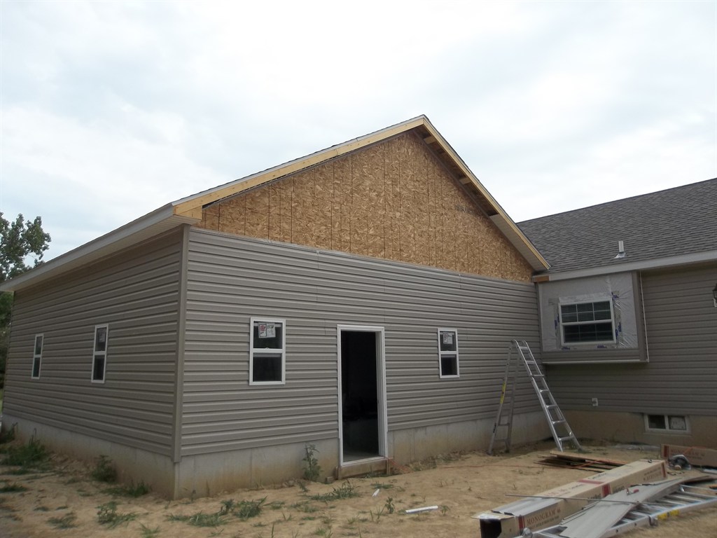 Finishing siding on attached garage addition