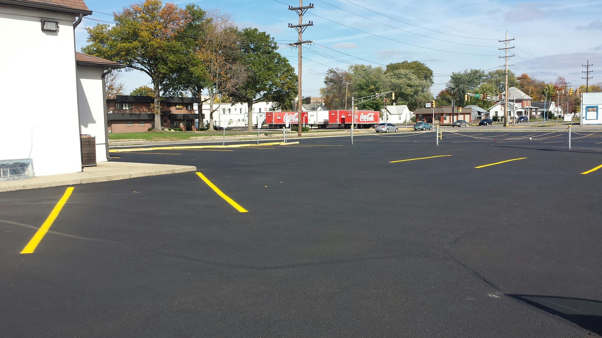 Wolls Commercial Sealing & Striping logo