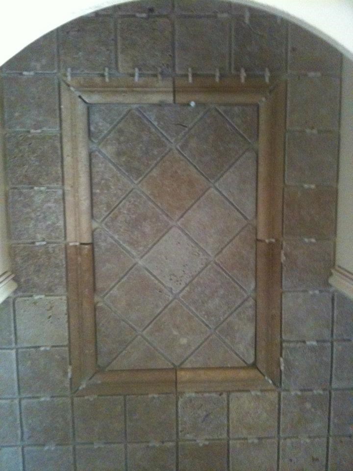 Stewart Tile & Stone logo