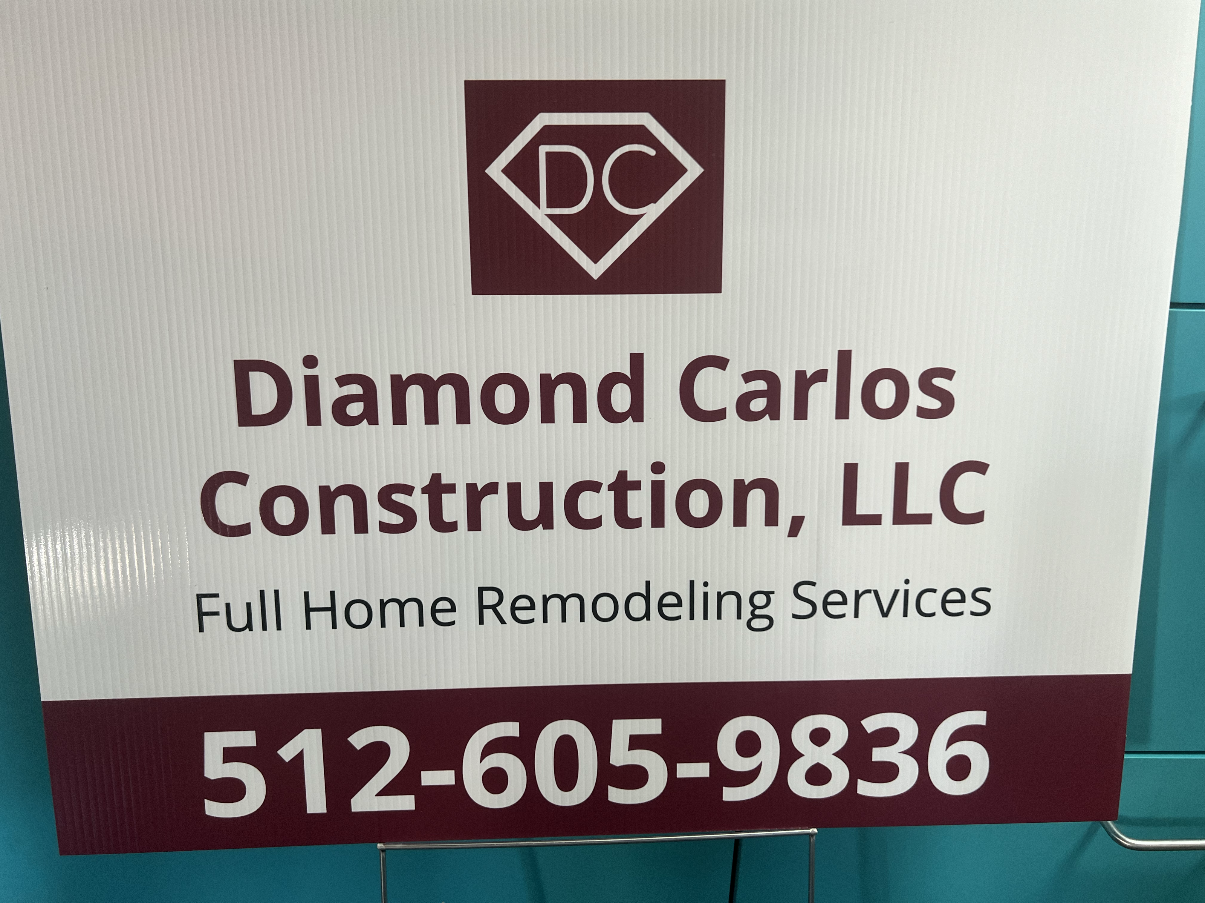 Logo for Diamond Carlos Construction