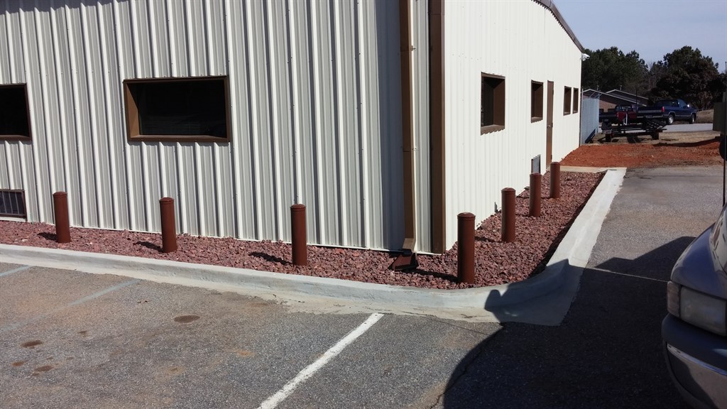 parking ballards and lava rock