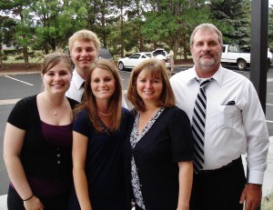 Mike with his wife and and children