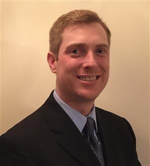 Phil Krabbe with RE/MAX Preferred Group logo