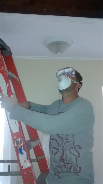 ATTIC REMOVING INSULATION