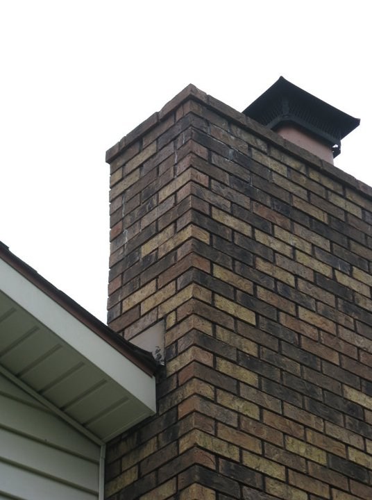 Greg McGehee Masonry logo