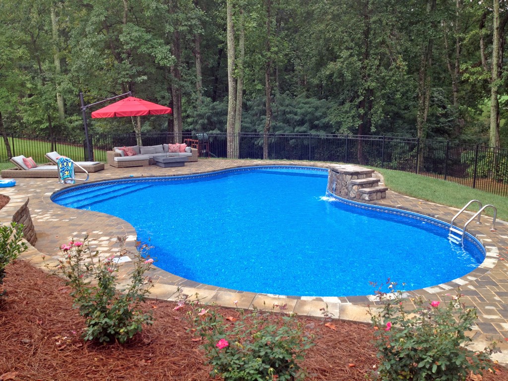 Lagoon shaped pool with waterfall