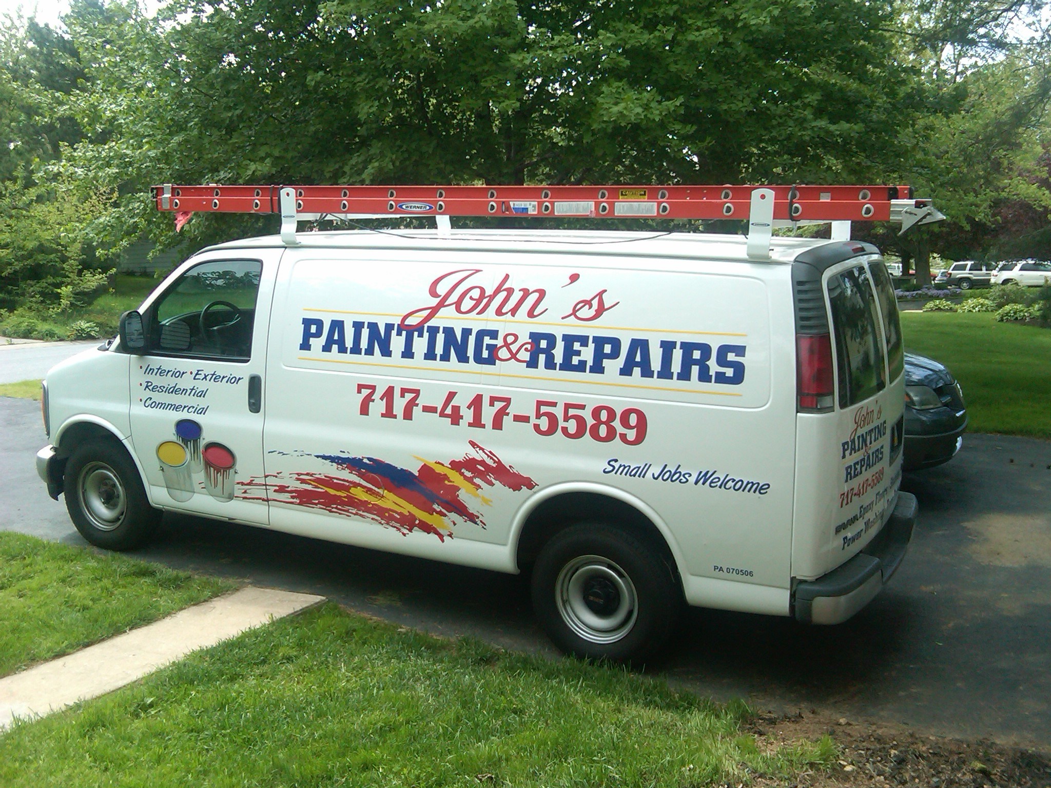 Logo for John's Painting & Repairs