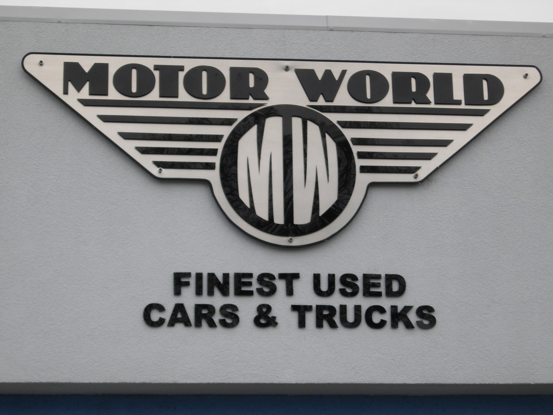 Logo for MOTOR WORLD