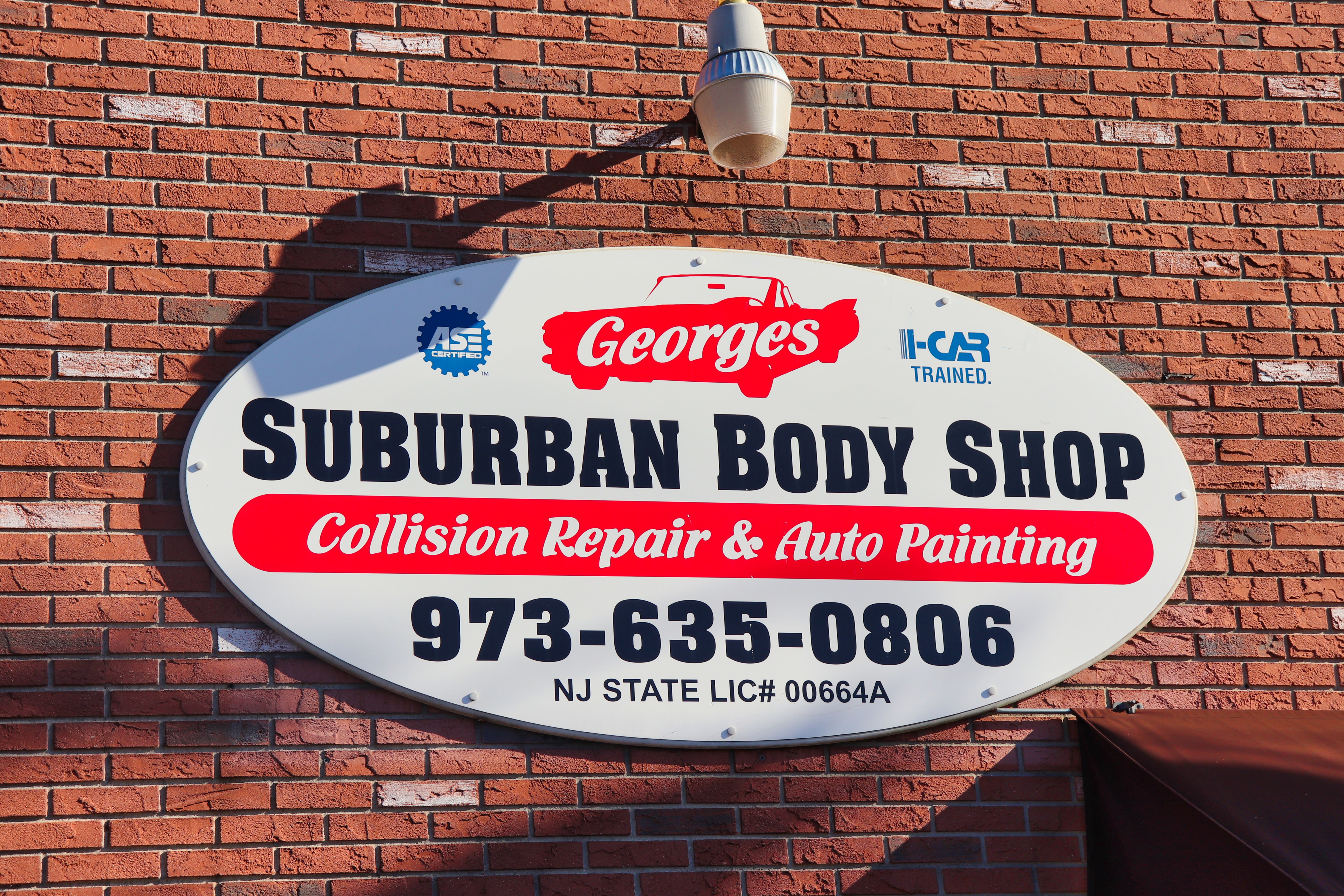 GEORGE'S SUBURBAN BODY SHOP logo