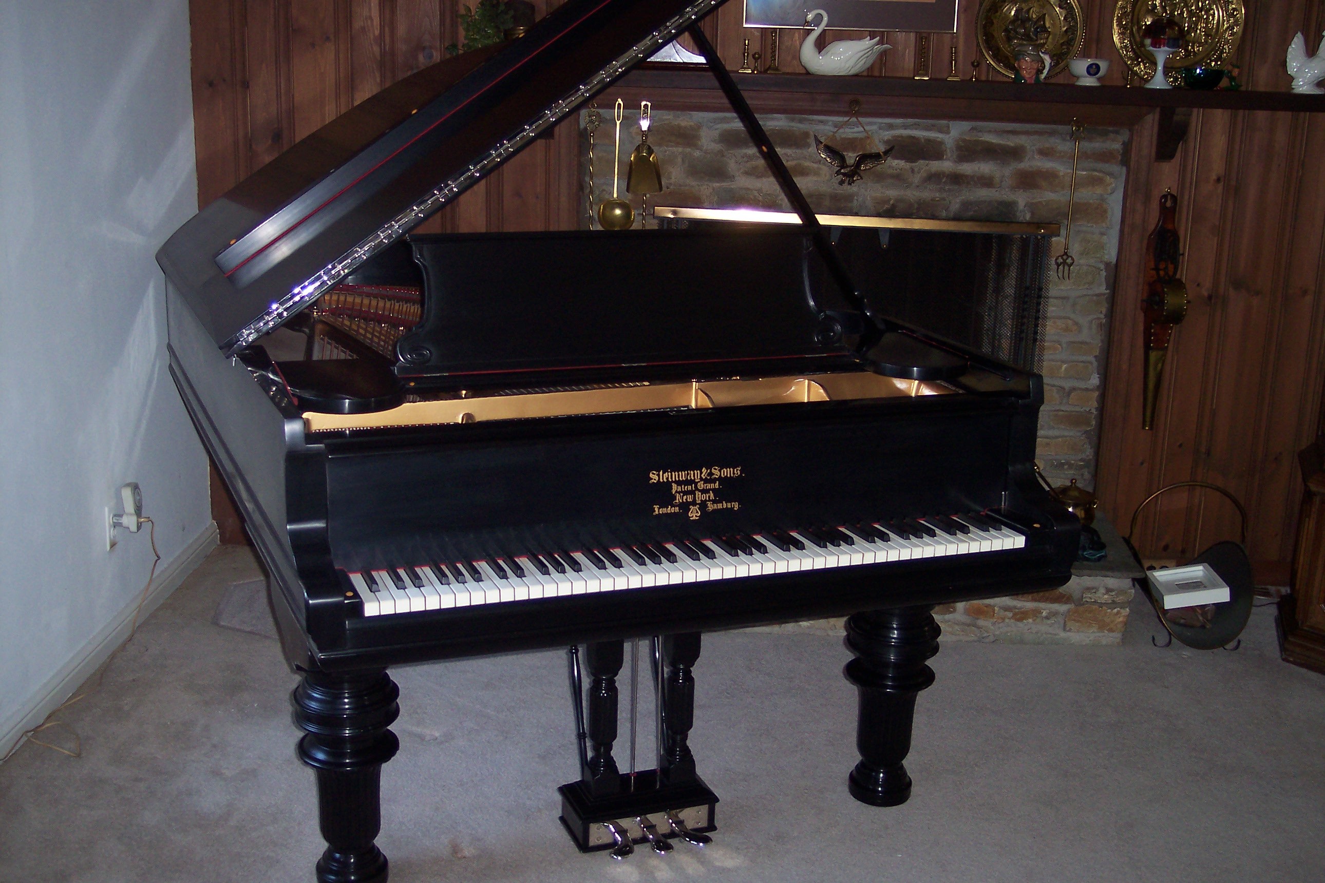 David G. Tennett Piano Rebuilding & Refinishing logo