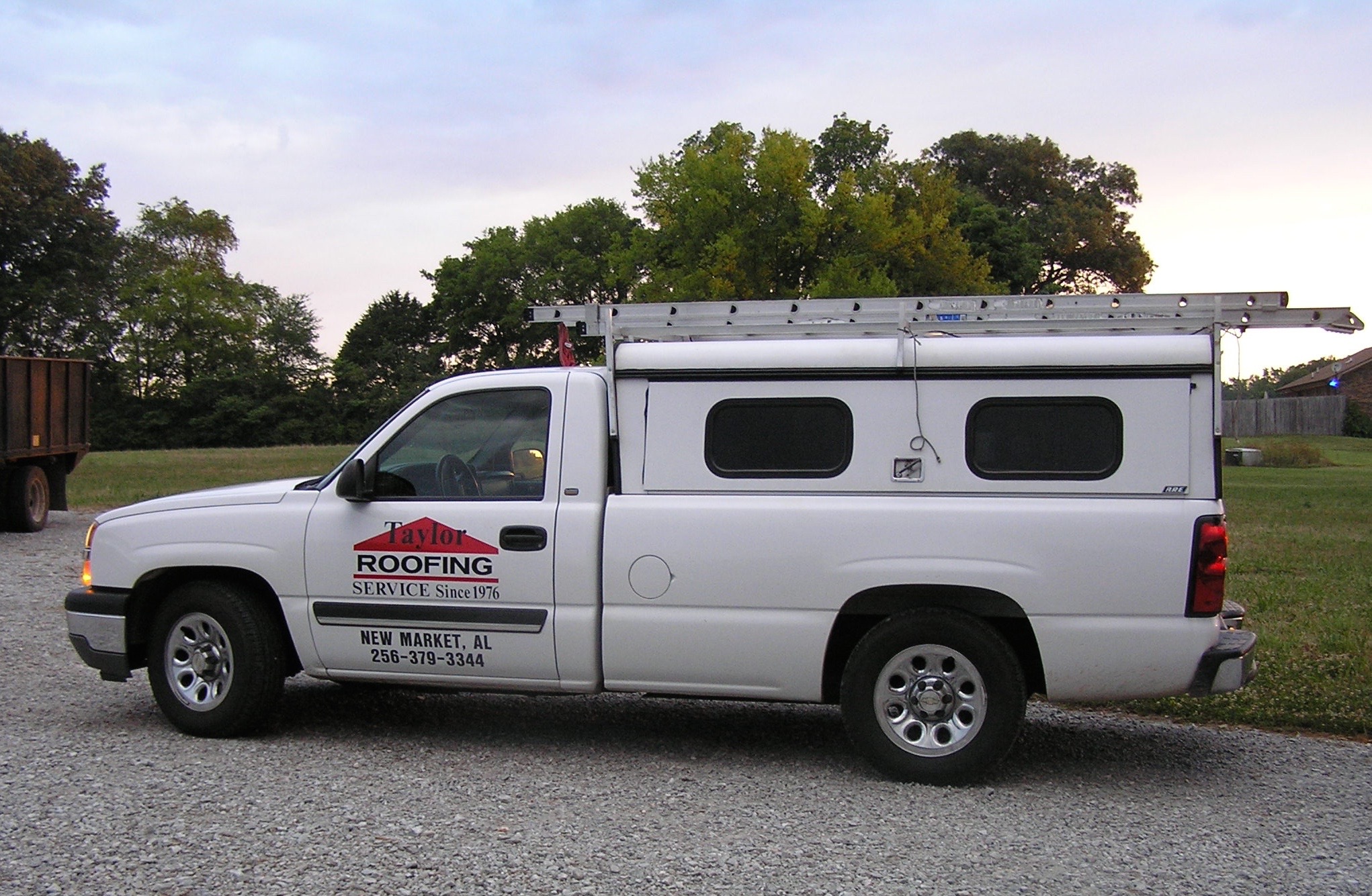 Logo for TAYLOR ROOFING
