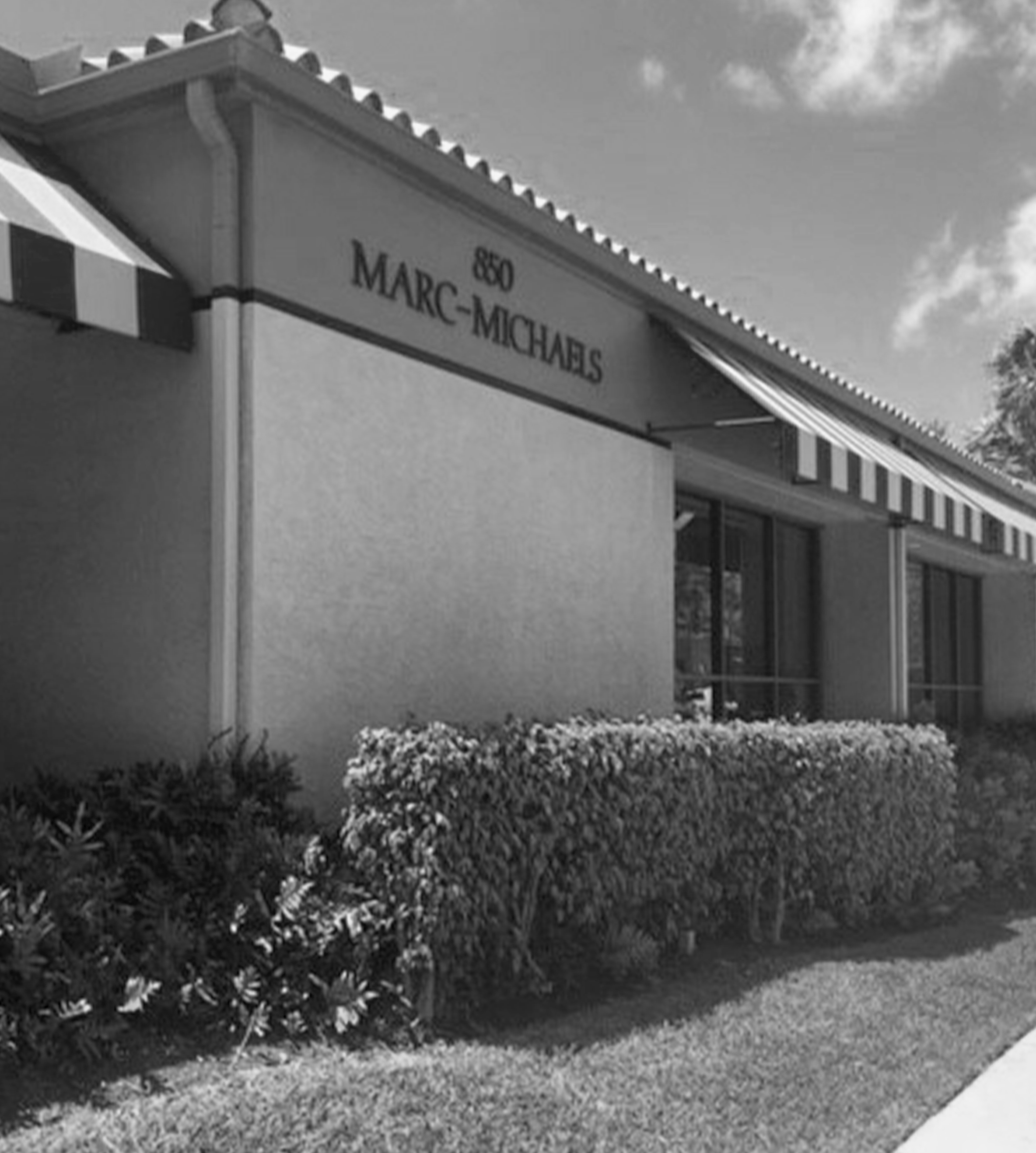 MARC-MICHAELS INTERIOR DESIGNS logo