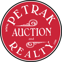 PETRAK AUCTION SVC logo