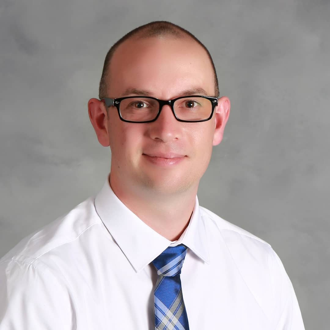 Kristofer Clark, REALTOR logo